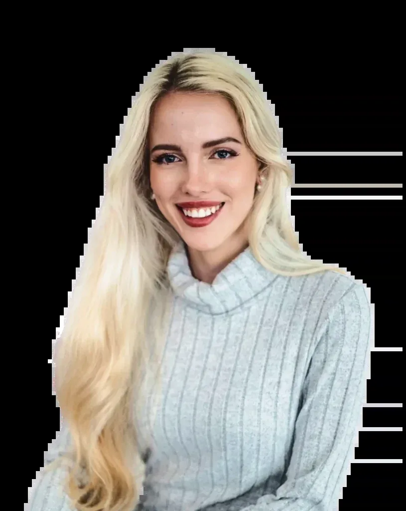 Tjaša Peterle, founder of Studio Merlin, smiling in a light knit sweater